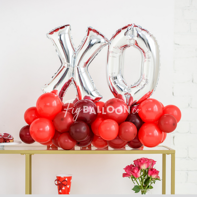 Shades of Red XO Balloon Tabletop Marquee