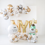 NYE Spilled Champagne Balloon Letter Stacks