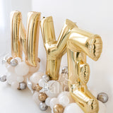 NYE Spilled Champagne Balloon Letter Stacks
