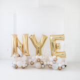 NYE Spilled Champagne Balloon Letter Stacks