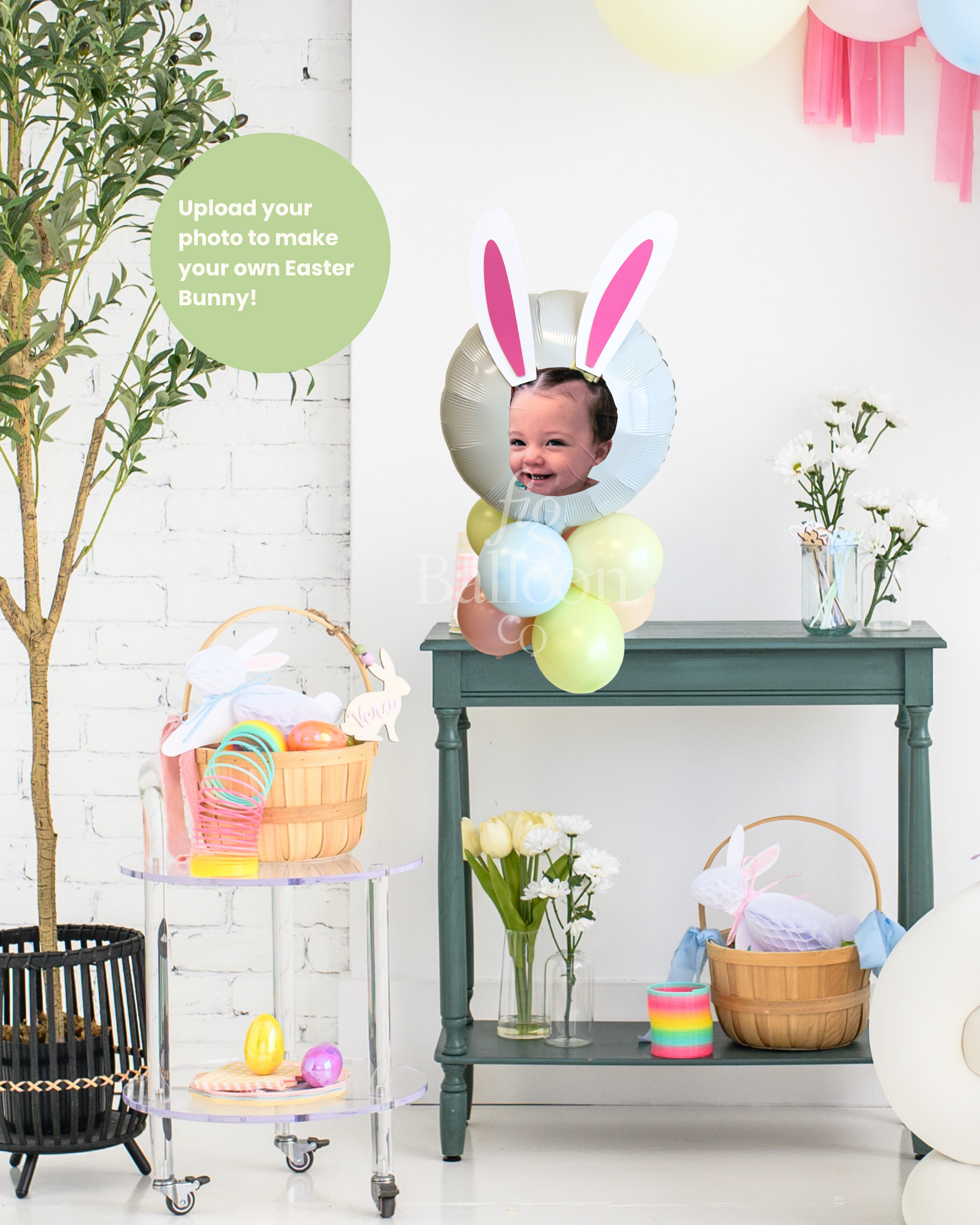 Easter-themed room with bunny ears, eggs, and a baby in a photo frame.