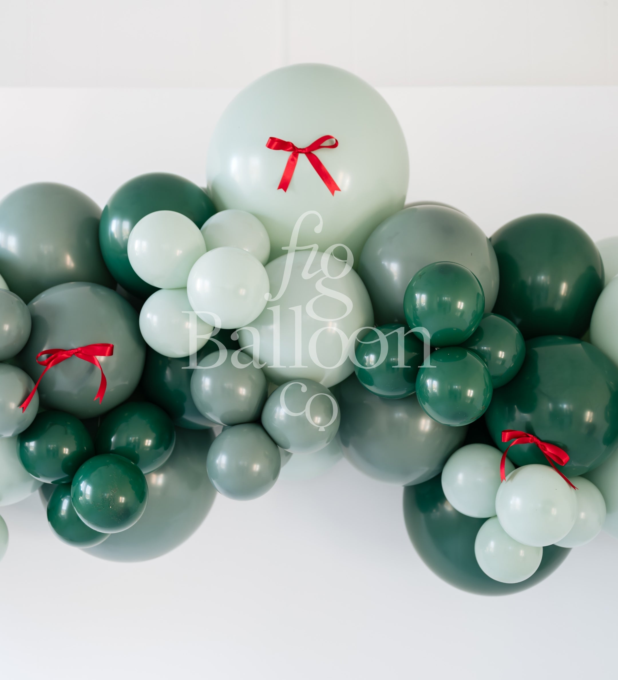 Evergreen with Red Satin Bows Balloon Garland